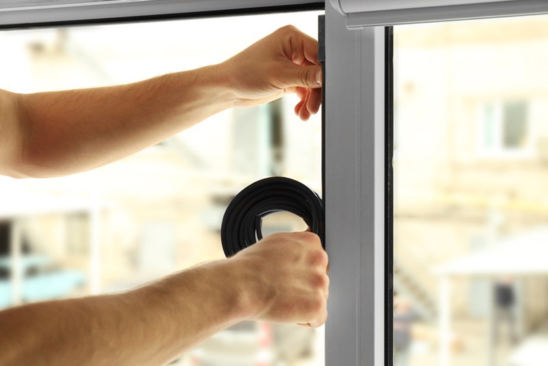 Tilting door seal installation